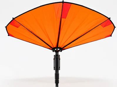 Concept of the bright orange canopy fully open on its pole.